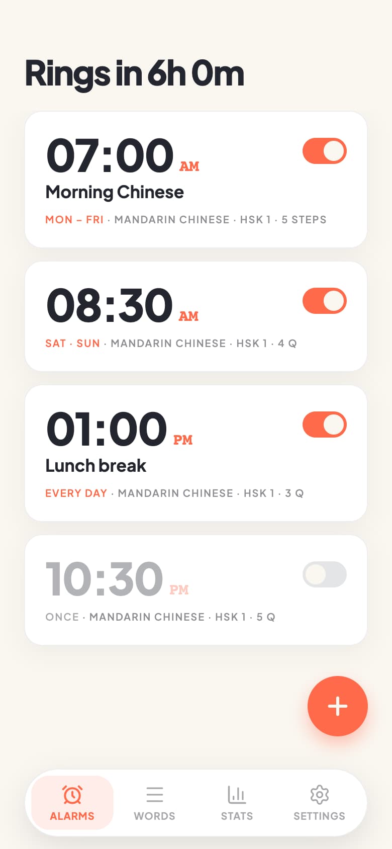 LingoAlarm showing a 7:00 AM Morning Chinese alarm and the Alarms, Words, Stats and Settings tabs